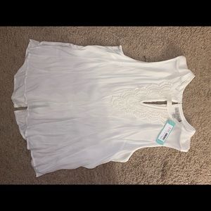 White sleeveless blouse